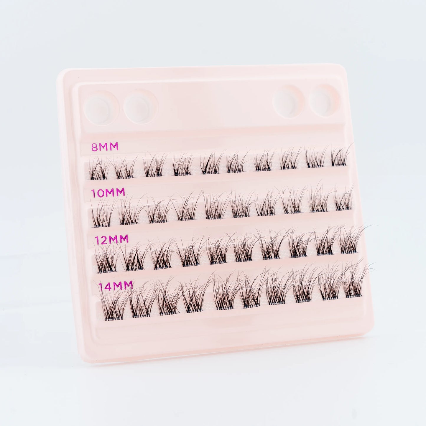 Project Beauty - Individual Cluster Eyelashes - Day to night theme - Fluffy, Dense & Voluminous. Image shows the product out of it's packaging against a white background.