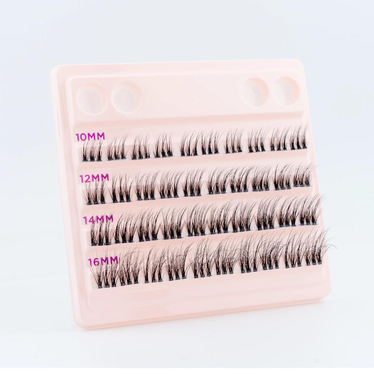 Project Beauty - Individual Cluster Eyelashes - 'Russian Volume' theme - Dramatic Lengthening Volume. Image shows the product out of it's packaging against a white background. The packaging is a light-pink box with gold and pink text.